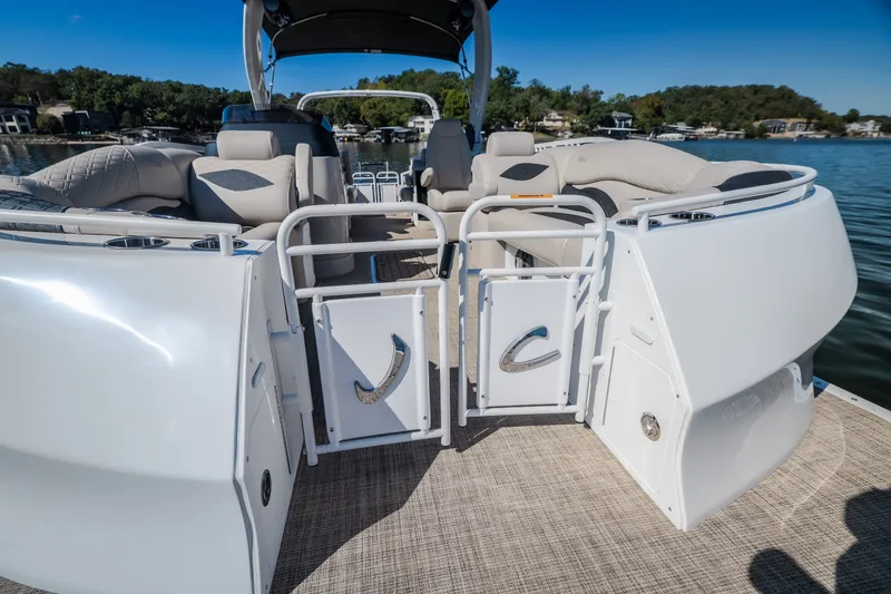 Slide: The Image of Luxury interior of 2026 JC Sporttoon 26TT pontoon boat on a serene lake. - 32