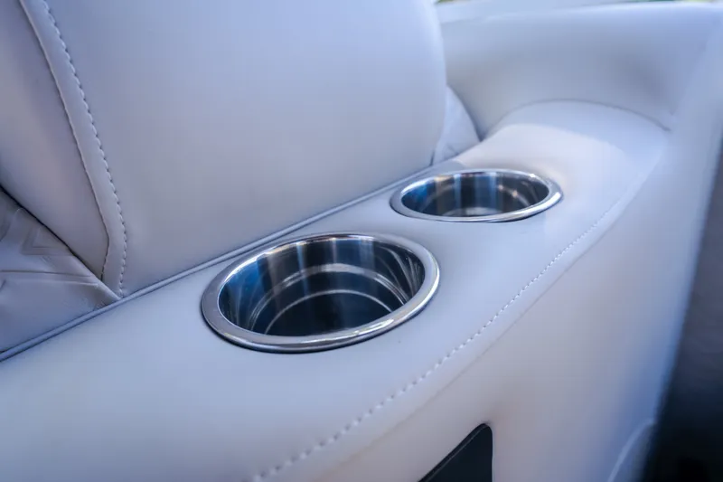Slide: The Image of Luxury seating with dual cup holders in 2026 JC Sporttoon 26TT boat. - 54
