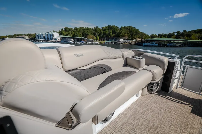 Slide: The Image of Luxurious seating on 2026 JC Sporttoon 26TT pontoon boat, with scenic waterfront view. - 26