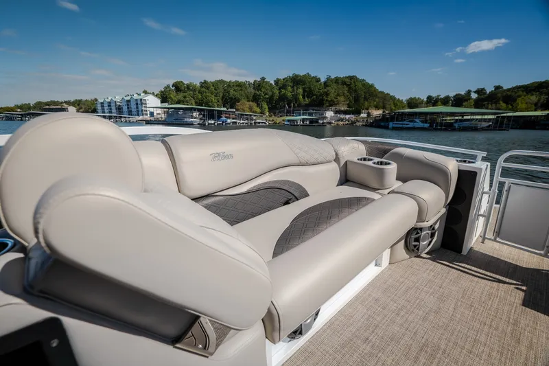 Slide: The Image of Luxurious seating on 2026 JC Sporttoon 26TT pontoon boat, with scenic waterfront view. - 25