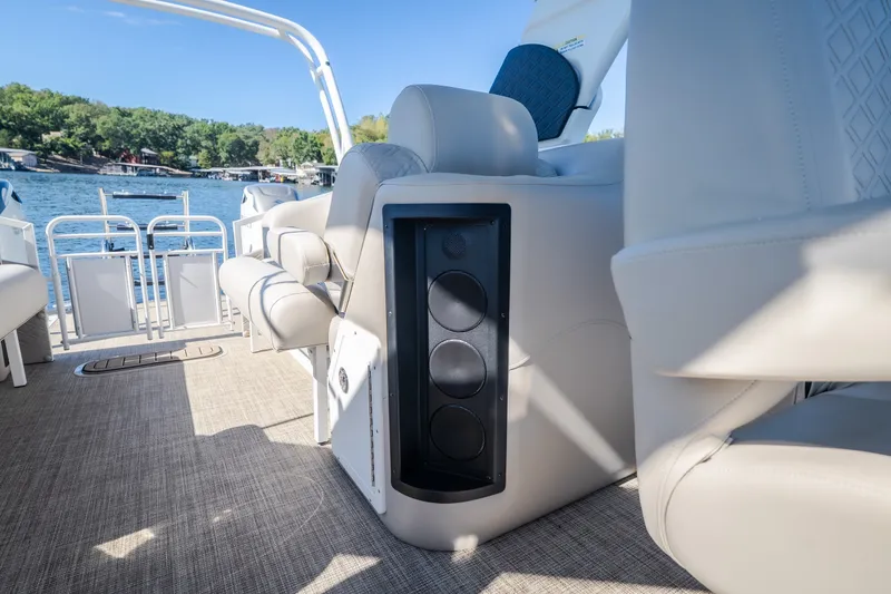 Slide: The Image of Luxury interior of 2026 JC Sporttoon 26TT pontoon boat with premium seating and speaker system. - 16
