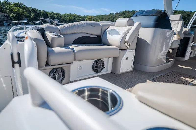 Slide: The Image of Luxurious interior of 2026 JC Sporttoon 26TT boat with plush seating and modern amenities. - 31