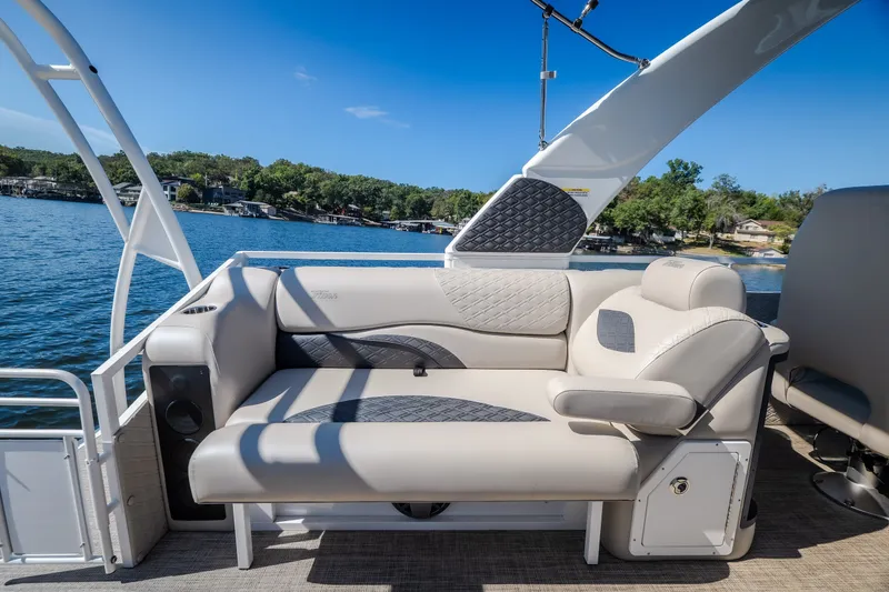 Slide: The Image of Luxurious seating on 2026 JC Sporttoon 26TT pontoon boat, with scenic lake view. - 46