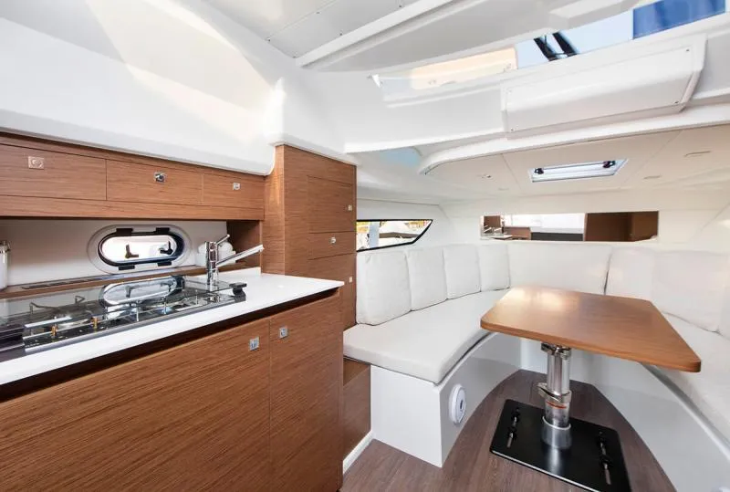 Slide: The Image of Manufacturer Provided Image: Interior of 2019 Jeanneau Leader 10.5 yacht with modern kitchen and seating area. - 11