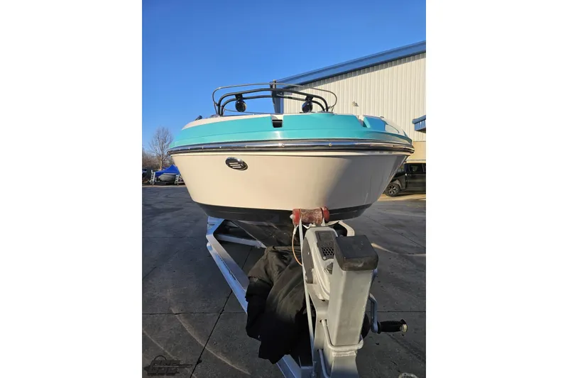 Slide: The Image of 2016 Chaparral Vortex 243 VRX boat on trailer, parked outdoors. - 10
