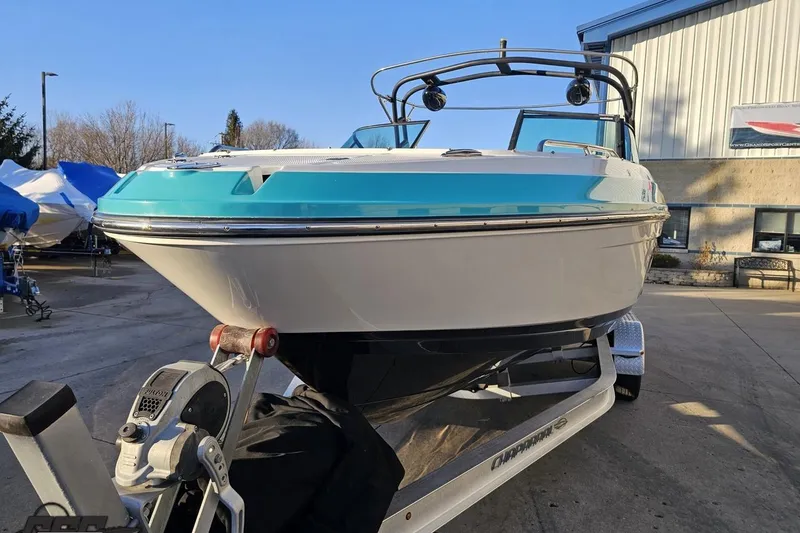 Slide: The Image of 2016 Chaparral Vortex 243 VRX boat on trailer, parked outdoors. - 14