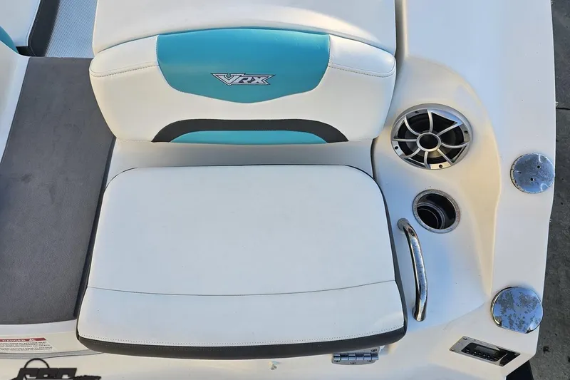 Slide: The Image of 2016 Chaparral Vortex 243 VRX boat seat with speaker and cup holder. - 38