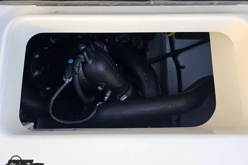 Slide: The Image of Engine compartment of 2016 Chaparral Vortex 243 VRX boat, showcasing internal components. - 39
