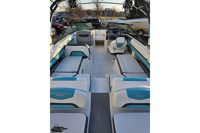 Slide: The Image of 2016 Chaparral Vortex 243 VRX boat interior with stylish seating and modern dashboard. - 41