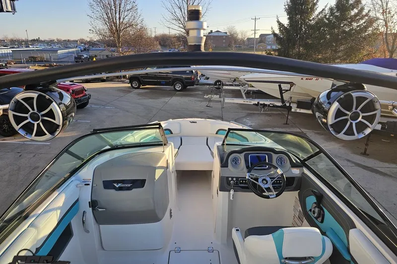 Slide: The Image of 2016 Chaparral Vortex 243 VRX boat interior with speakers and steering wheel. - 42