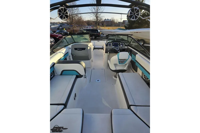 Slide: The Image of 2016 Chaparral Vortex 243 VRX boat interior with seating and steering wheel. - 45