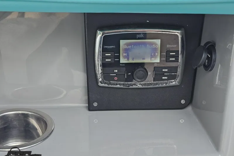 Slide: The Image of Polk Bluetooth audio system in 2016 Chaparral Vortex 243 VRX boat. - 53