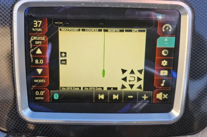 Slide: The Image of 2016 Chaparral Vortex 243 VRX dashboard display showing navigation and fuel data. - 63