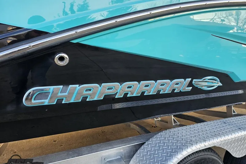 Slide: The Image of 2016 Chaparral Vortex 243 VRX boat with turquoise and black exterior detailing. - 7