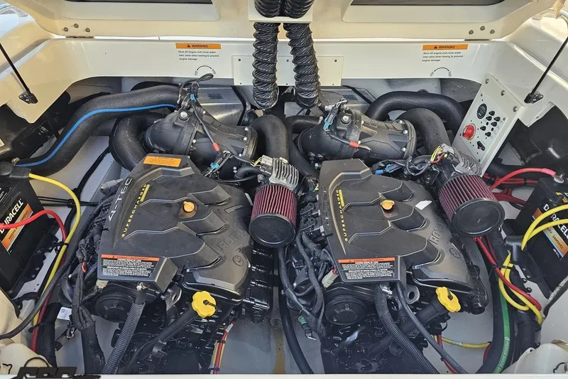 Slide: The Image of 2016 Chaparral Vortex 243 VRX engine compartment with dual Rotax engines and wiring. - 90