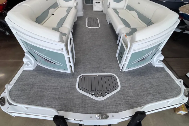Slide: The Image of 2026 JC Neptoon 25TT Sport pontoon boat interior with stylish seating and modern flooring. - 10