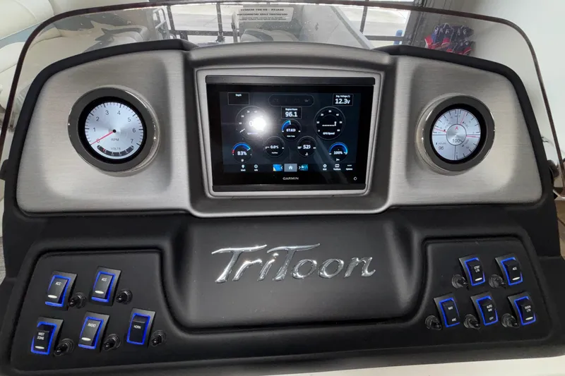 Slide: The Image of Dashboard of 2026 JC Neptoon 25TT Sport with digital display and controls. - 28