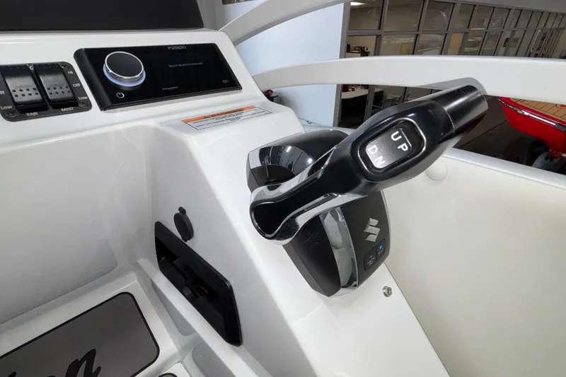 Slide: The Image of Control panel of 2026 JC Neptoon 25TT Sport boat with throttle lever. - 31