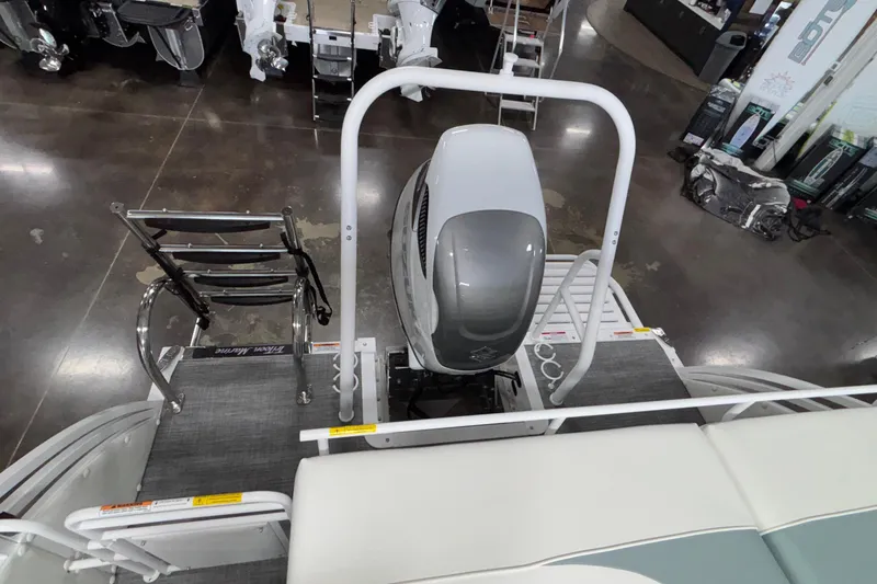 Slide: The Image of 2026 JC Neptoon 25TT Sport boat with outboard motor and swim ladder. - 14