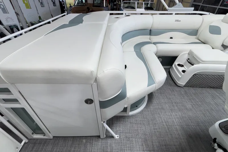 Slide: The Image of 2026 JC Neptoon 25TT Sport boat interior with white and gray seating. - 15