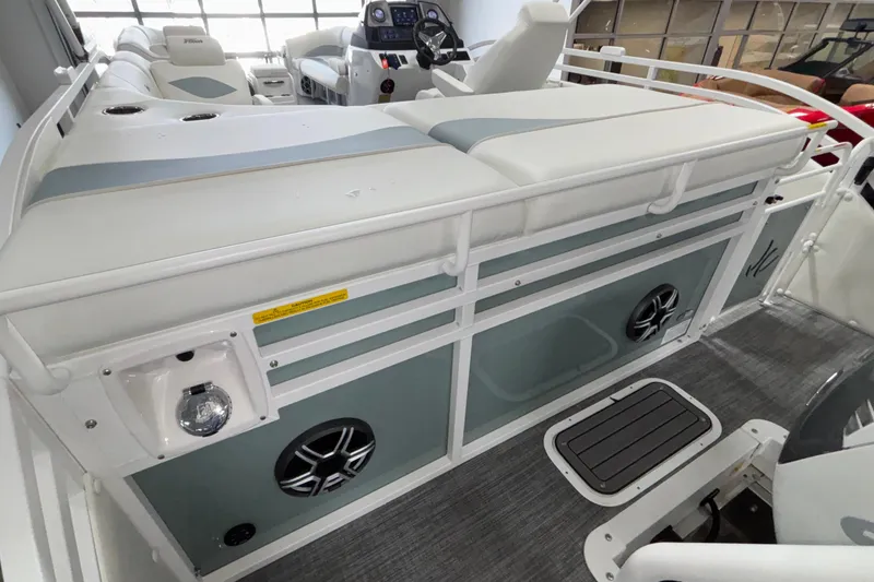 Slide: The Image of 2026 JC Neptoon 25TT Sport boat interior with plush seating and modern controls. - 32