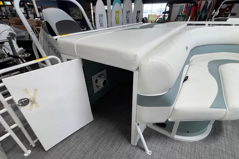 Slide: The Image of 2026 JC Neptoon 25TT Sport pontoon boat interior with white and gray seating. - 34