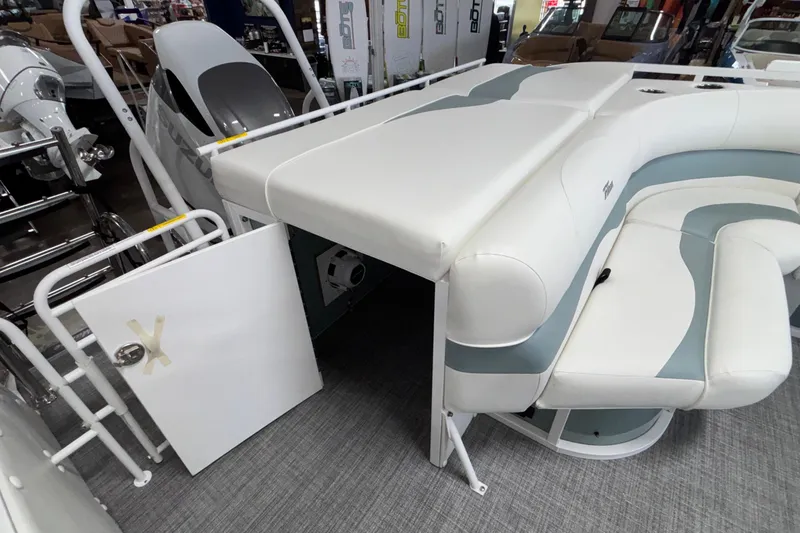 Slide: The Image of 2026 JC Neptoon 25TT Sport pontoon boat interior with white and gray seating. - 35