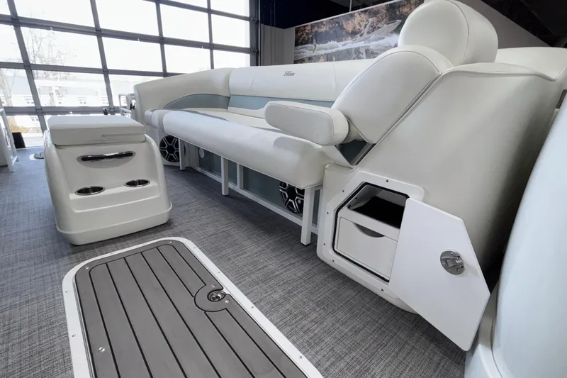 Slide: The Image of Luxurious interior of 2026 JC Neptoon 25TT Sport pontoon boat with plush seating. - 40