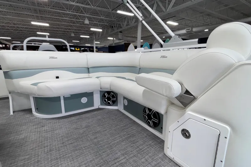 Slide: The Image of Luxurious interior of 2026 JC Neptoon 25TT Sport pontoon boat with plush seating. - 49