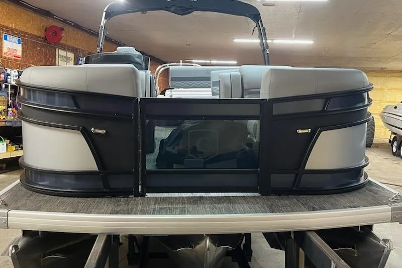 Slide: The Image of 2026 MONACO 235SFL pontoon boat in a garage setting. - 14