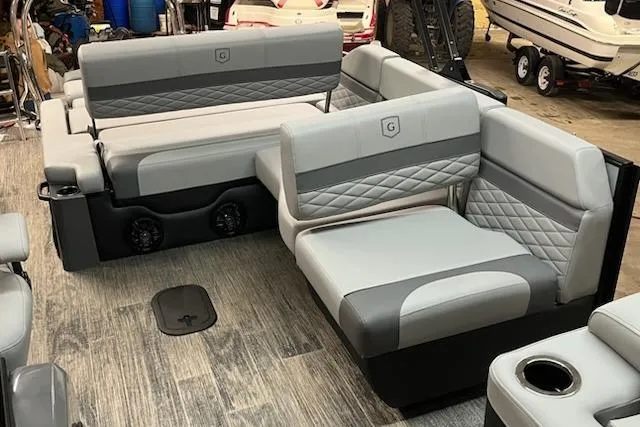 Slide: The Image of Luxurious 2026 MONACO 235SFL boat interior with stylish gray seating and modern design. - 18