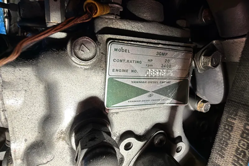 Slide: The Image of Yanmar diesel engine label on a 1984 C&C 35-3 sailboat, model 3GMF, 20 HP. - 21