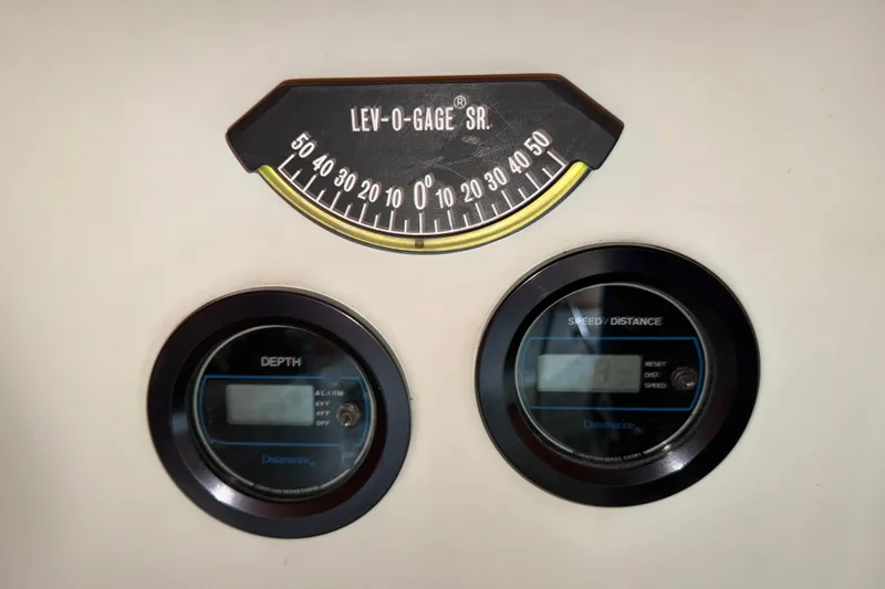 Slide: The Image of Boat instrument panel with Lev-O-Gage, depth, and speed/distance gauges, C&C 35-3, 1984 model. - 42