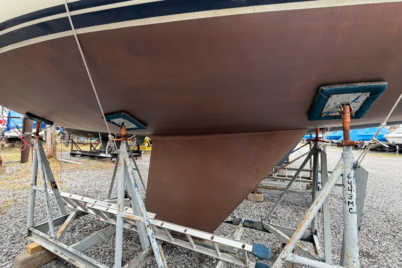 Slide: The Image of 1984 C&C 35-3 sailboat hull on stands, ready for maintenance. - 47