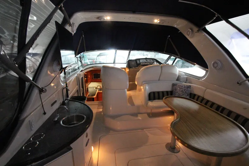 Slide: The Image of Interior of 2007 Four Winns 378 Vista yacht with seating and table. - 16
