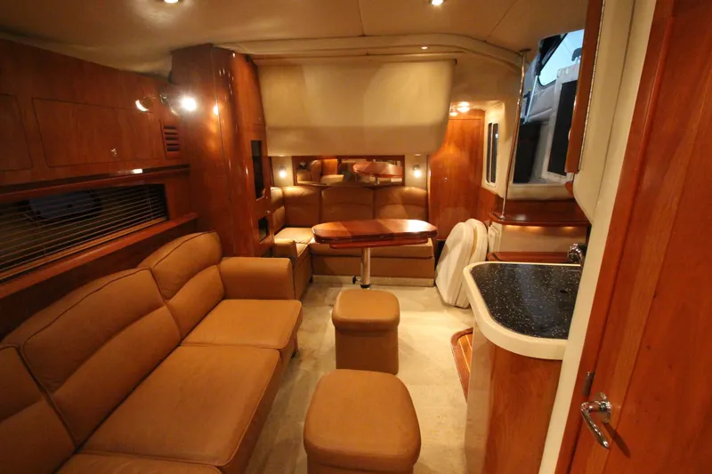 Slide: The Image of Luxurious interior of 2007 Four Winns 378 Vista yacht with elegant wood finishes. - 27
