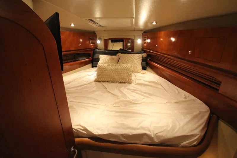 Slide: The Image of Luxurious cabin interior of 2007 Four Winns 378 Vista yacht with cozy bedding. - 33