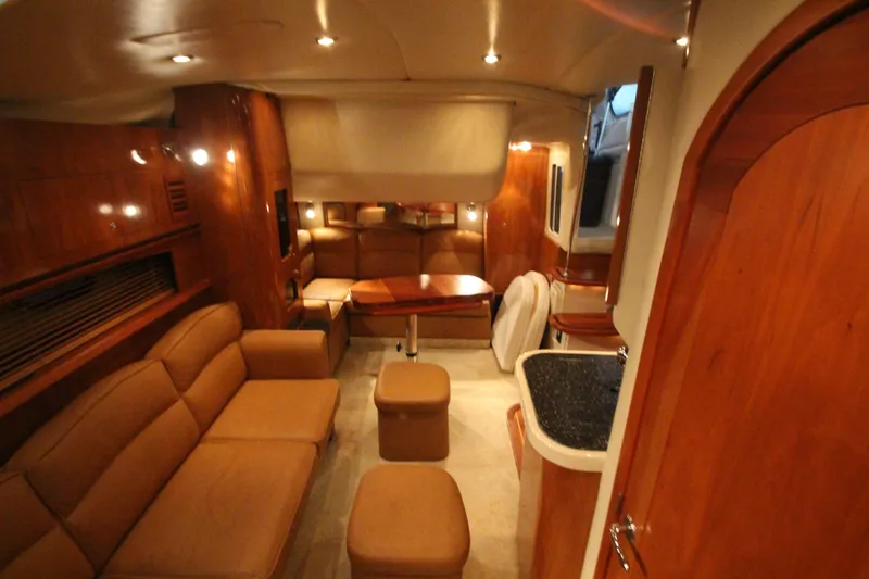 Slide: The Image of Luxurious interior of 2007 Four Winns 378 Vista yacht with elegant wood finishes. - 36