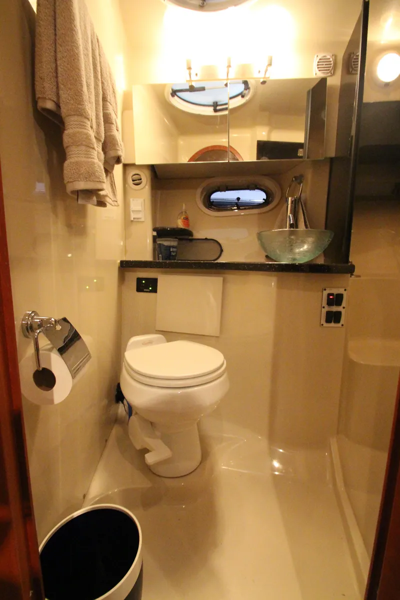 Slide: The Image of 2007 Four Winns 378 Vista yacht bathroom with modern fixtures and porthole window. - 38