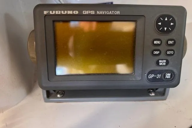 Slide: The Image of Furuno GPS Navigator on 1994 Catalina 270 boat, model GP-31, with control buttons. - 19