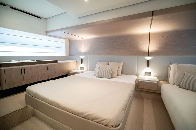 Slide: The Image of Luxurious bedroom interior of 2026 Azimut Fly 53 yacht, featuring modern design and elegant lighting. - 24