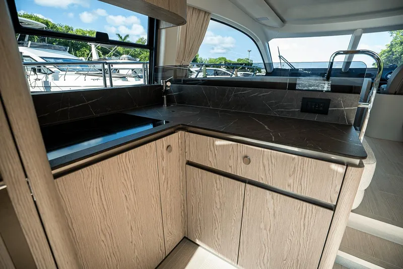Slide: The Image of Modern kitchen interior of 2026 Azimut Fly 53 yacht with sleek countertops. - 8