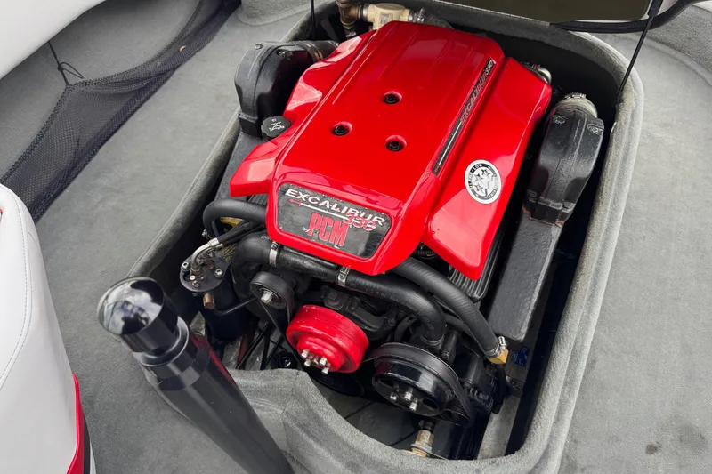 Slide: The Image of 2004 Correct Craft Air Nautique 216 Limited engine with red PCM Excalibur cover. - 18