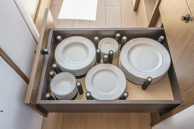 Slide: The Image of Drawer with neatly organized plates on Azimut Fly 72 yacht, 2026 model. - 15