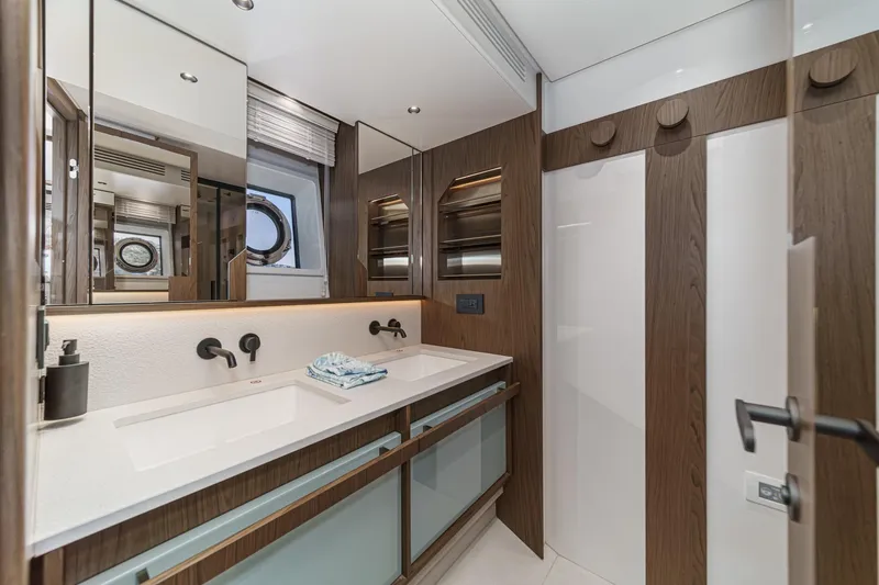 Slide: The Image of Luxurious bathroom interior of 2026 Azimut Fly 72 yacht with modern fixtures. - 18