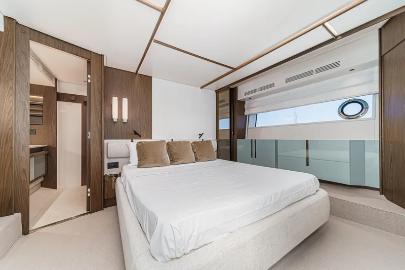 Slide: The Image of Luxurious bedroom interior of 2026 Azimut Fly 72 yacht with modern design and elegant furnishings. - 19