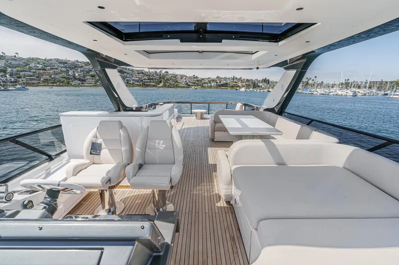 Slide: The Image of Luxurious 2026 Azimut Fly 72 yacht interior with elegant seating and scenic ocean view. - 5
