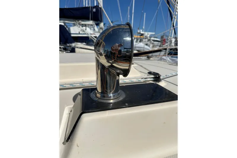 Slide: The Image of 1991 Island Packet 35 sailboat deck with chrome vent detail. - 10