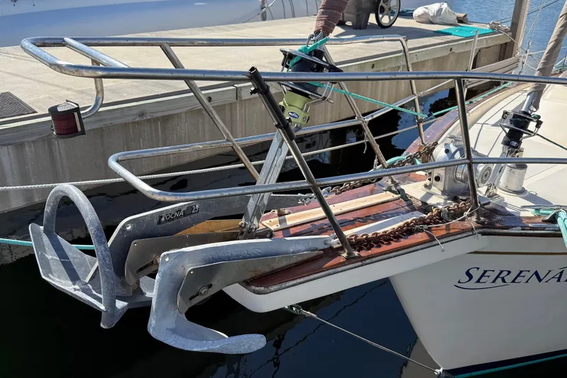 Slide: The Image of 1991 Island Packet 35 sailboat with dual Rocna anchors at dock. - 4