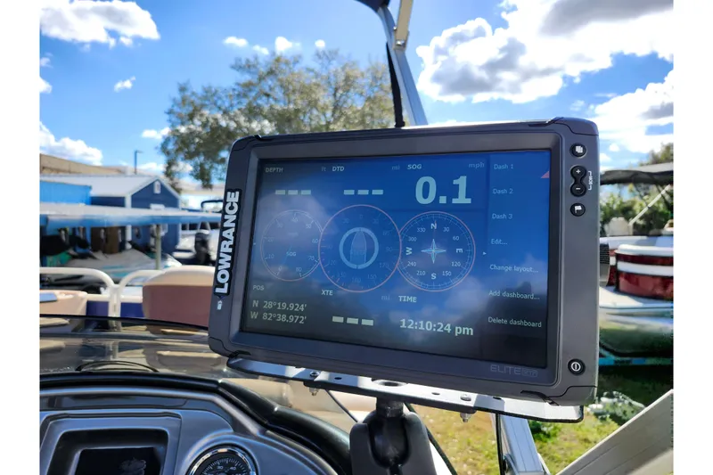 Slide: The Image of Lowrance navigation system on 2018 Sun Tracker Fishin' Barge 22 DLX, displaying coordinates and speed. - 30